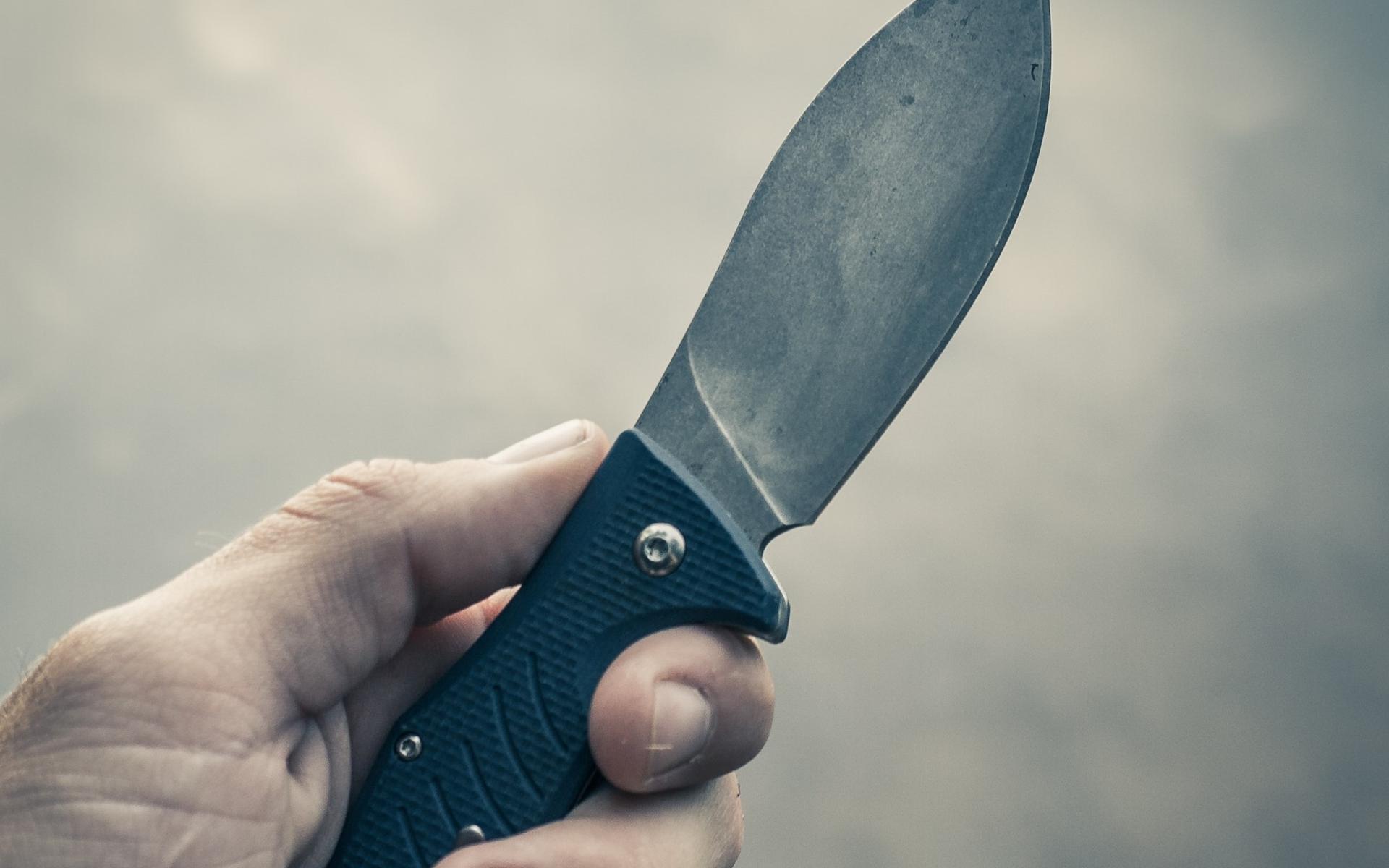 Person mit Messer